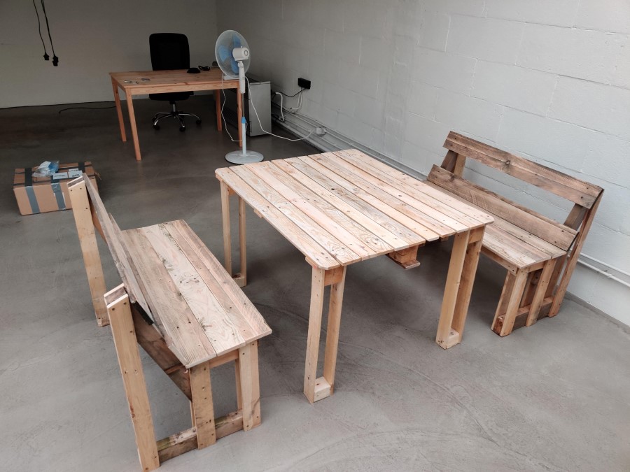 Wooden benches made from pallet wood.